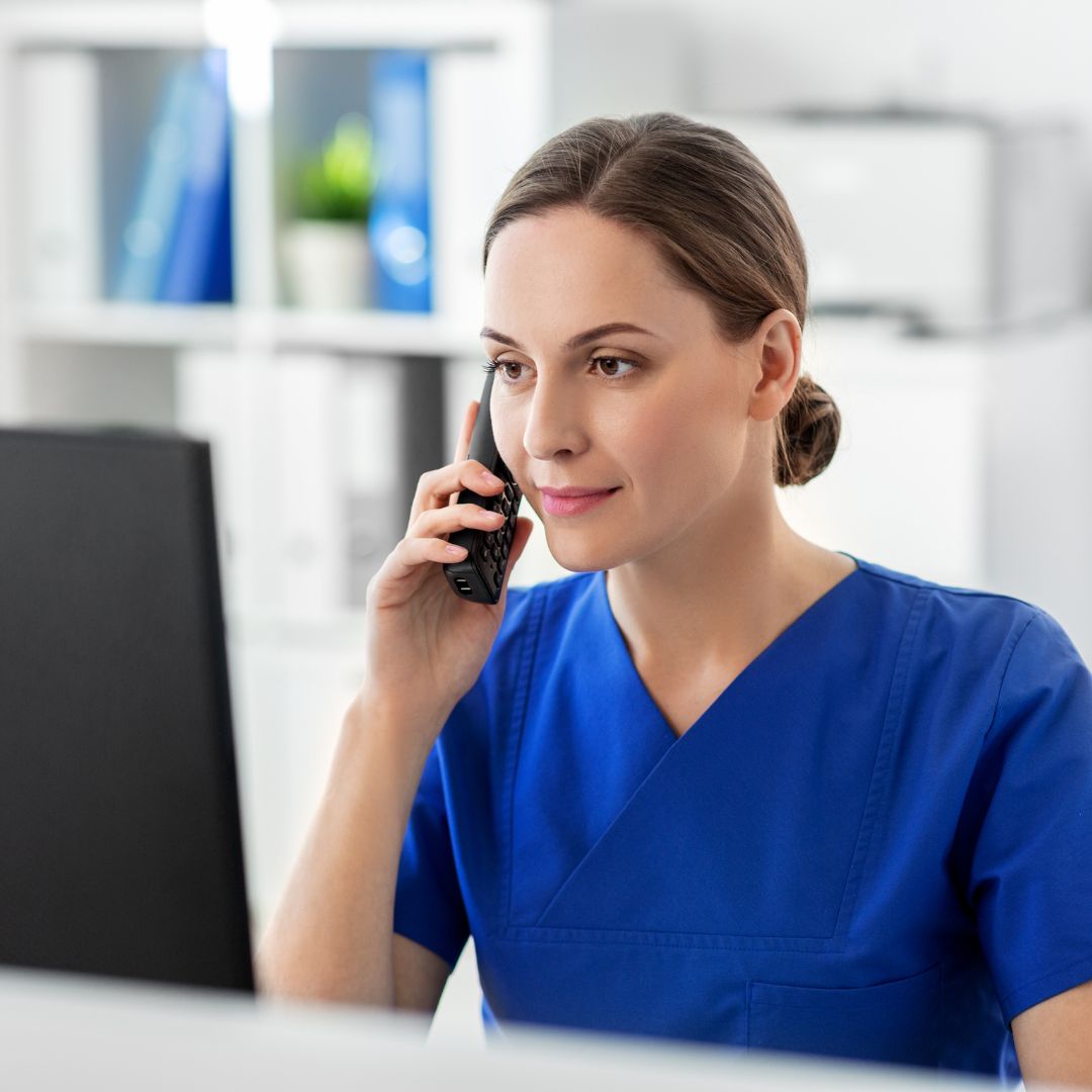 healthcare professional on phone